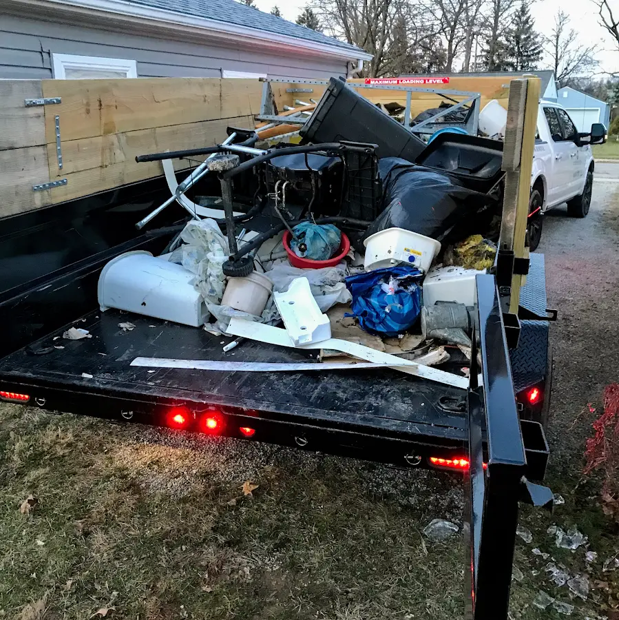 Roll-off dumpster delivered to a residential driveway in Eldon